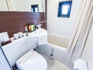 Hotel Livemax Premium Umeda East Осака Стая снимка